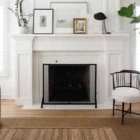 Fireplace with white finishing and decorations